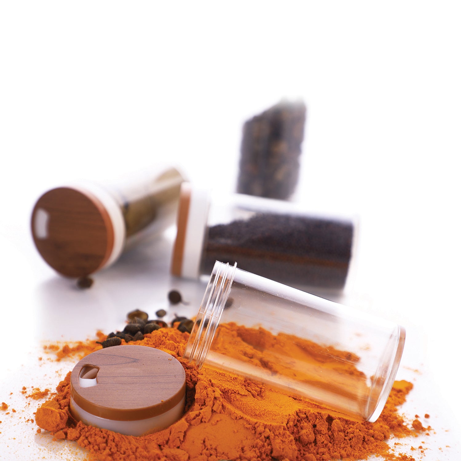 Masala box on an Indian kitchen counter beside cooking ingredients