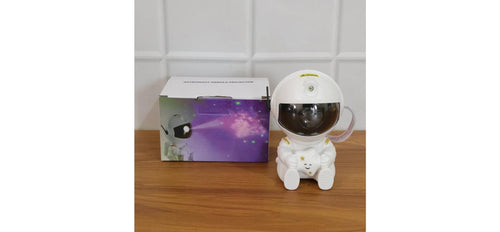 Astronaut Galaxy Star Projector Night Lamp – shown next to retail packaging box