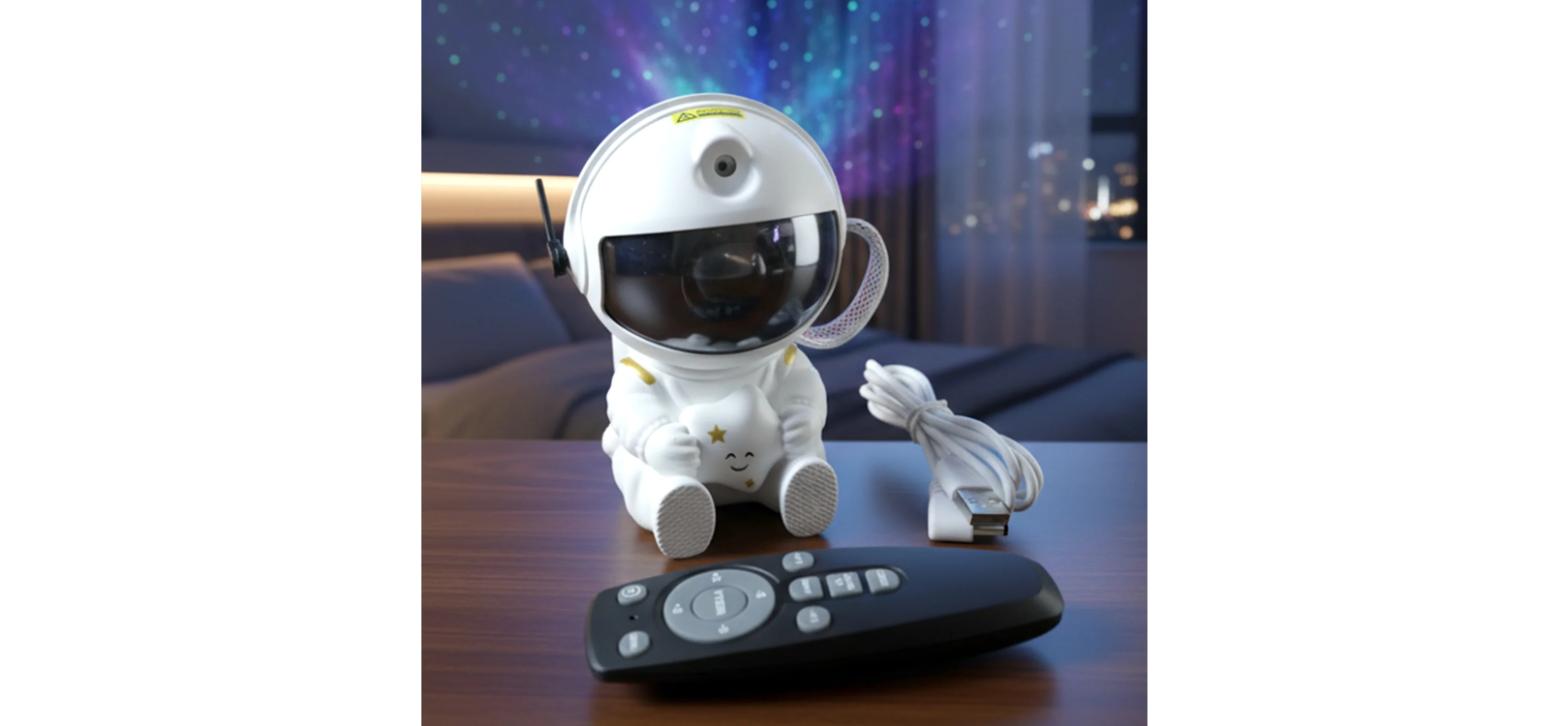 Astronaut Galaxy Star Projector Night Lamp – lifestyle shot with ambient star projection at night