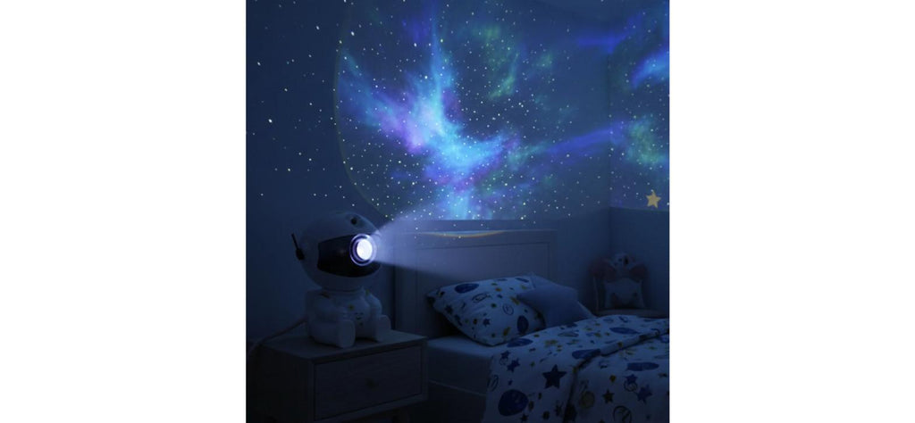 Astronaut Galaxy Star Projector Night Lamp – projecting a nebula and stars onto a child's bedroom wall